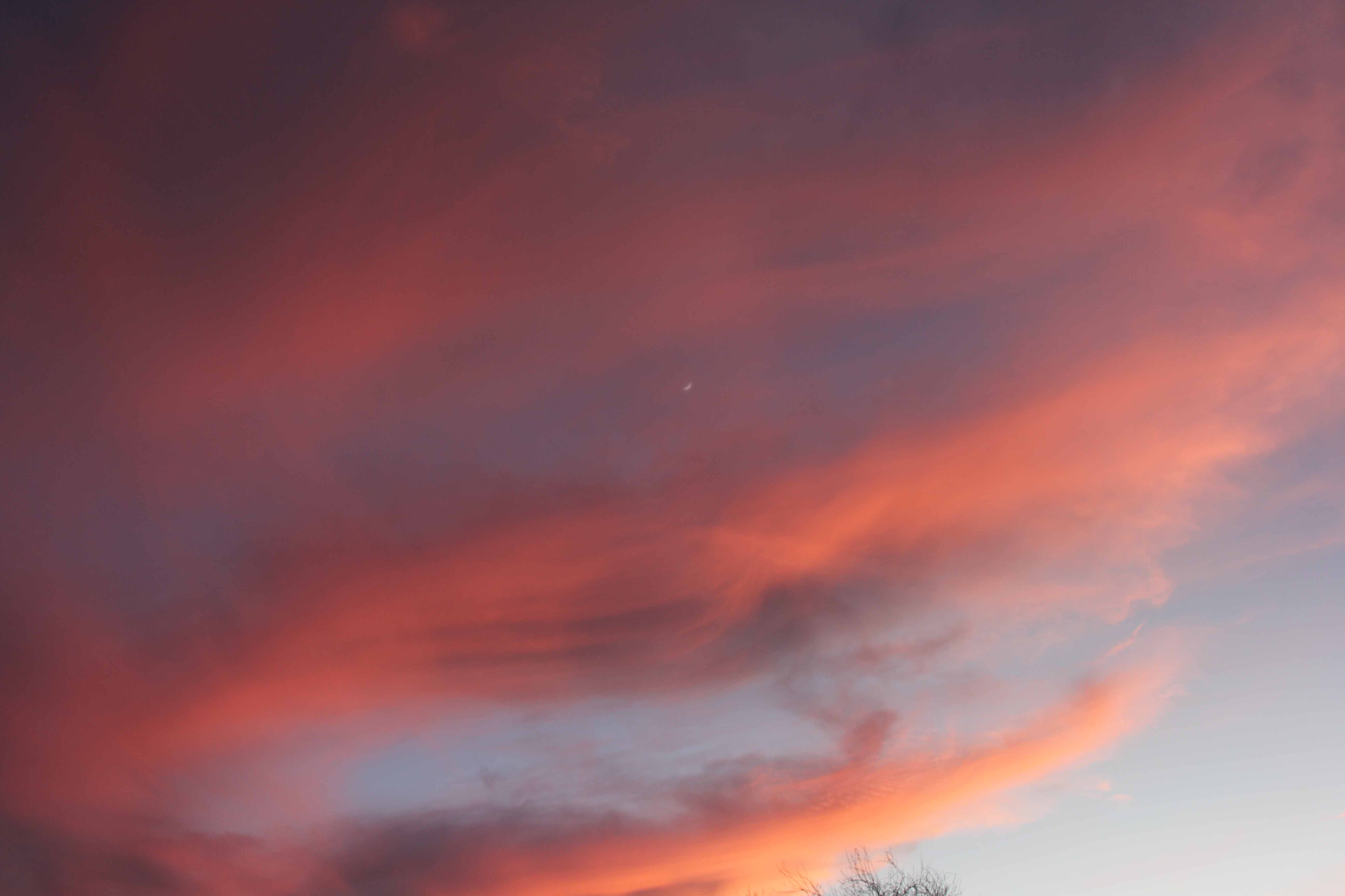 Orange sunset sky with moon
